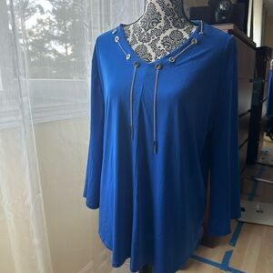 Chico’s blue blouse with gold chain